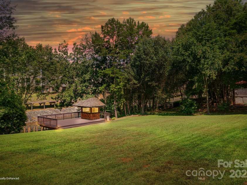 126 Emerald Drive, Mooresville, NC 28117.  MLS# CAR4224232, YatesRealty ID 14855. Enjoy a refreshing drink from your tikibar.
