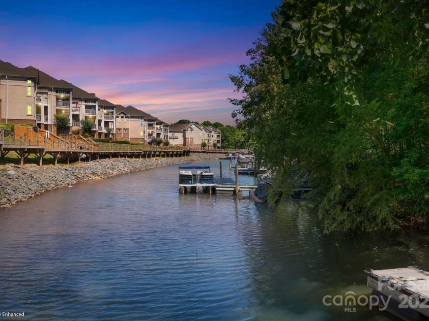 126 Emerald Drive, Mooresville, NC 28117.  MLS# CAR4224232, YatesRealty ID 14855. Gaze at the beautiful views from your backyard / dock.