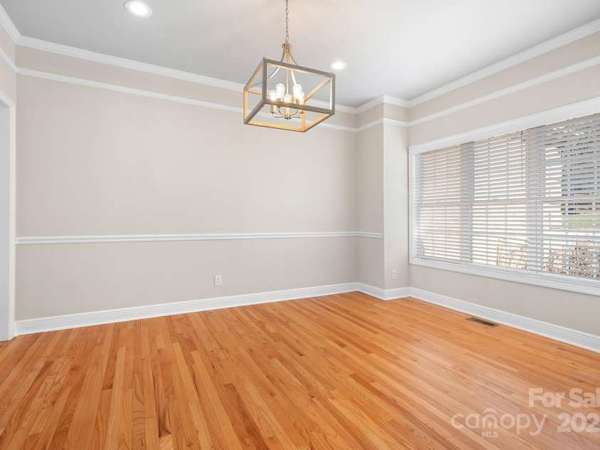 126 Emerald Drive, Mooresville, NC 28117.  MLS# CAR4224232, YatesRealty ID 14855. Spacious Dining Room for friends and/or family.