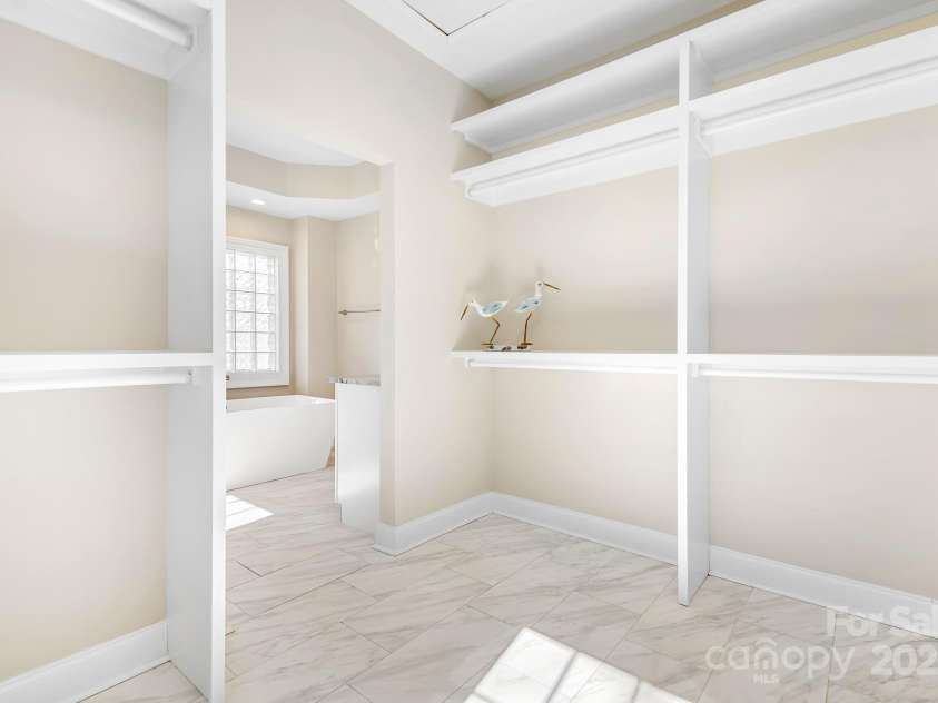 126 Emerald Drive, Mooresville, NC 28117.  MLS# CAR4224232, YatesRealty ID 14855. The Primary Closet is large and Roomy.