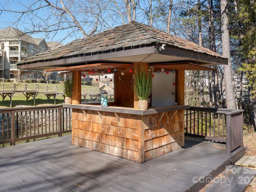 126 Emerald Drive, Mooresville, NC 28117.  MLS# CAR4224232, YatesRealty ID 14855. The Tikihut is waiting for you to entertain