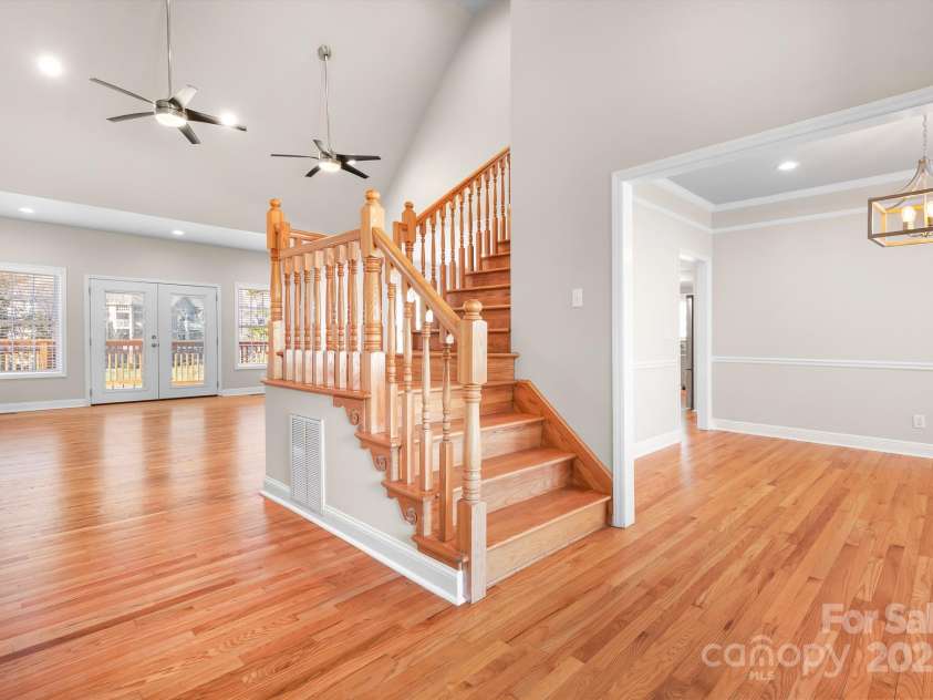 126 Emerald Drive, Mooresville, NC 28117.  MLS# CAR4224232, YatesRealty ID 14855. Upon entering the house, you have an open view to the living room