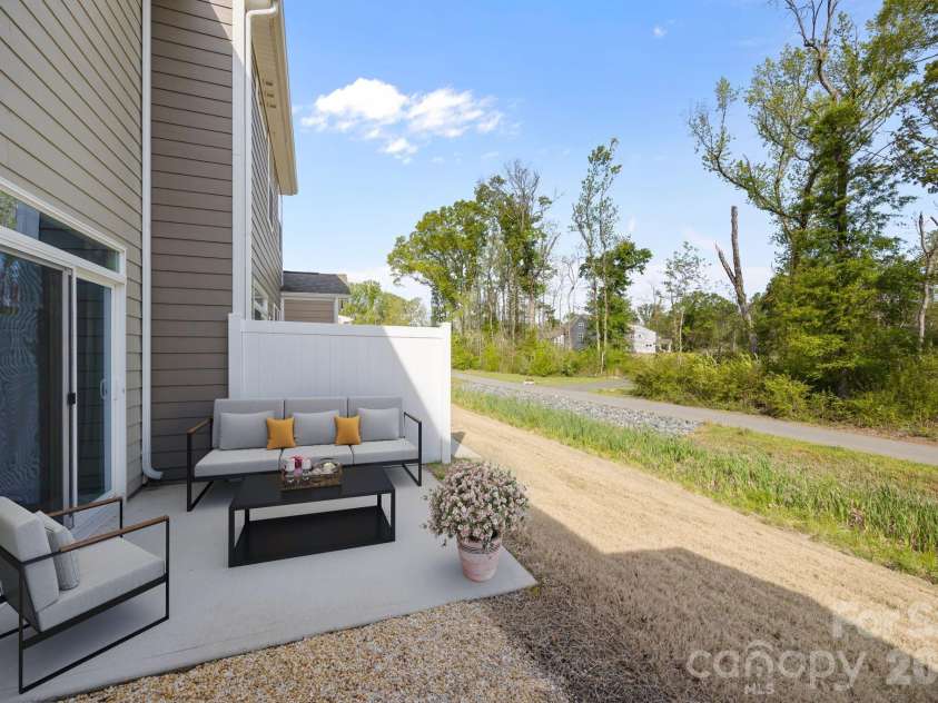 3950 Rothwood Lane, Harrisburg, NC 28075.  MLS# CAR4367827, YatesRealty ID 14857. Virtually staged back patio