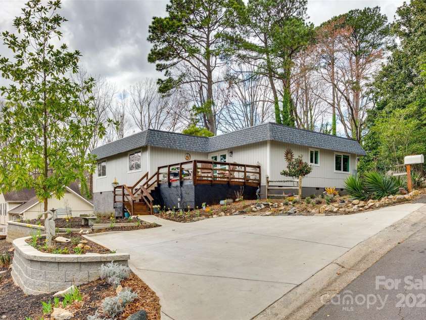 16137 Tana Tea Circle, Tega Cay, SC 29708.  MLS# CAR4227926, YatesRealty ID 14860. Beautiful new custom landscaping and landscape retaining walls (2024)