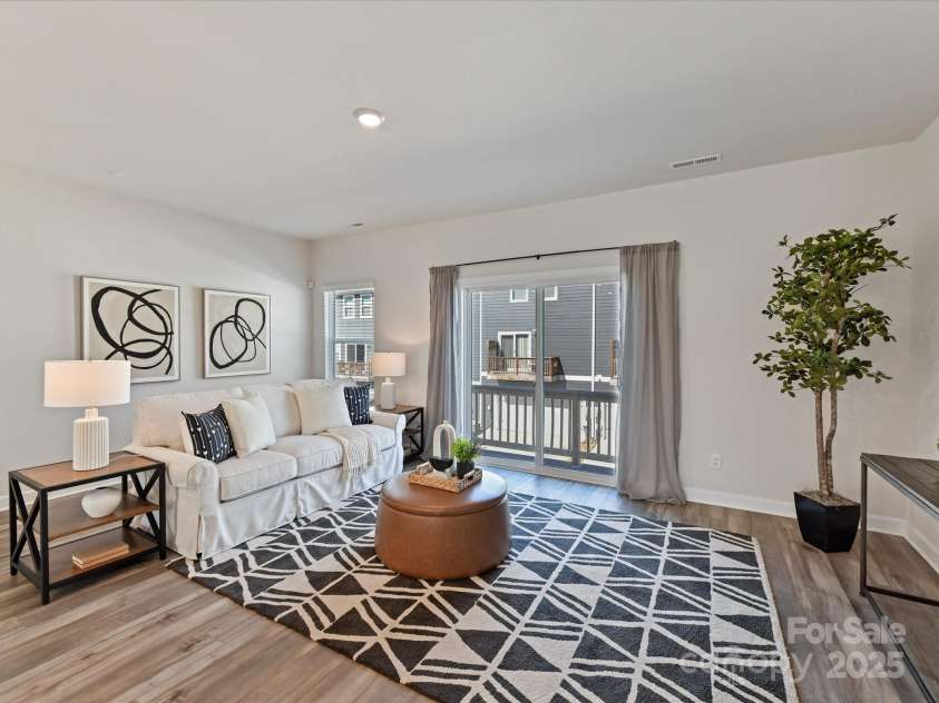 2610 Greenmarket Drive, Charlotte, NC 28217.  MLS# CAR4233387, YatesRealty ID 14864. Upper Level Den with access to exterior balcony