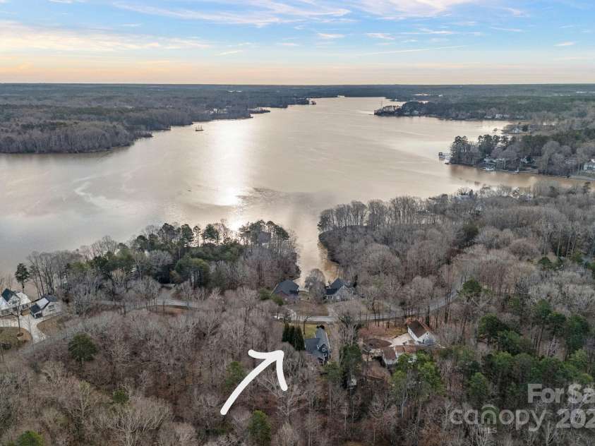 1665 Sherwood Court, Sherrills Ford, NC 28673.  MLS# CAR4223633, YatesRealty ID 14866. Across the street from Lake Norman, enjoy beautiful views from your cottage-style home with community lake access!
