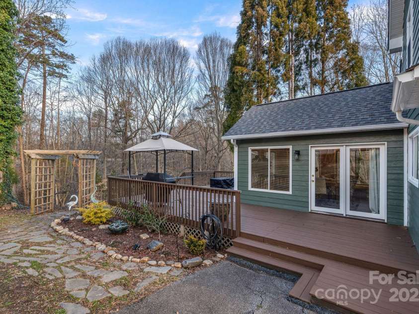 1665 Sherwood Court, Sherrills Ford, NC 28673.  MLS# CAR4223633, YatesRealty ID 14866. Courtyard area of the garden with an arbor to the backyard