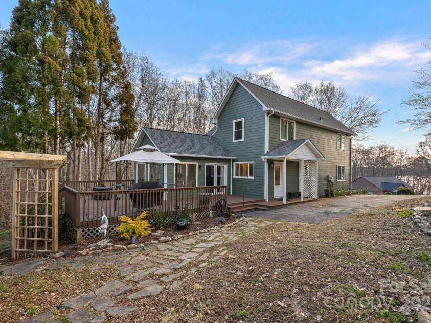1665 Sherwood Court, Sherrills Ford, NC 28673.  MLS# CAR4223633, YatesRealty ID 14866. Great outdoor living space and cottage-style gardens!