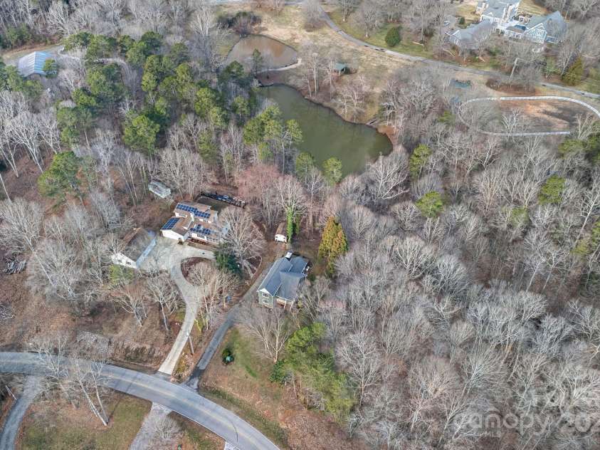 1665 Sherwood Court, Sherrills Ford, NC 28673.  MLS# CAR4223633, YatesRealty ID 14866. Quiet and peaceful setting on the shores of Lake Norman! Surrounded by trees & nature, enjoy your quiet slice of lake life heaven!
