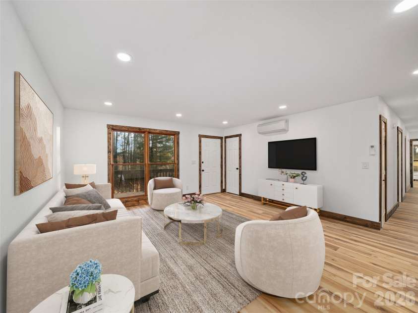 139 Church Street, Burnsville, NC 28714.  MLS# CAR4332497, YatesRealty ID 1487. Main home Living room - Virtual Staging 