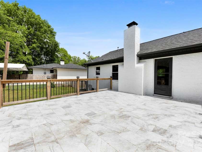 1316 Fox Run Drive, Charlotte, NC 28212.  MLS# CAR4235193, YatesRealty ID 14870. Huge tiled back deck