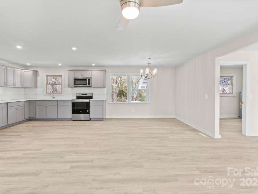 174 Maske Road, Mount Gilead, NC 27306.  MLS# CAR4259918, YatesRealty ID 14872. Living rm and kitchen