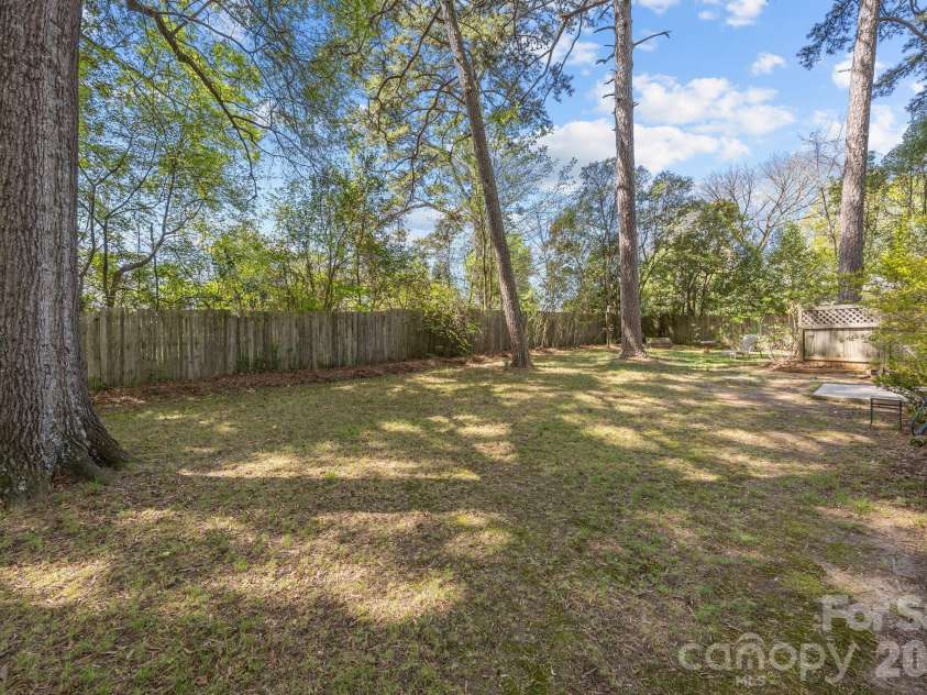127 Lilly Avenue, Salisbury, NC 28144.  MLS# CAR4367272, YatesRealty ID 14873. Private yard perfect for relaxing or entertaining!