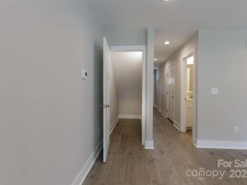 2014 Crown Point Drive, Albemarle, NC 28001.  MLS# CAR4195914, YatesRealty ID 14881. Storage under the stairs