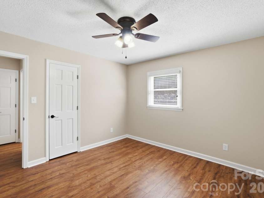 2814 Williams Road, Matthews, NC 28105.  MLS# CAR4372223, YatesRealty ID 14882. 3rd bedroom w/two closets and ceiling fan