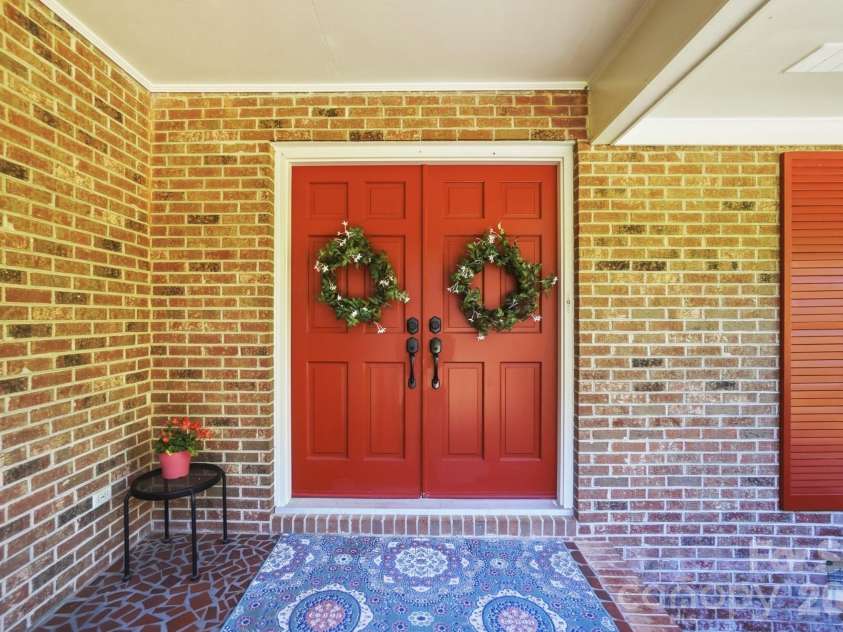 2814 Williams Road, Matthews, NC 28105.  MLS# CAR4372223, YatesRealty ID 14882. Covered front porch with double doors
