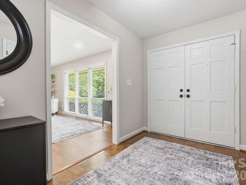 2814 Williams Road, Matthews, NC 28105.  MLS# CAR4372223, YatesRealty ID 14882. Double front doors, foyer