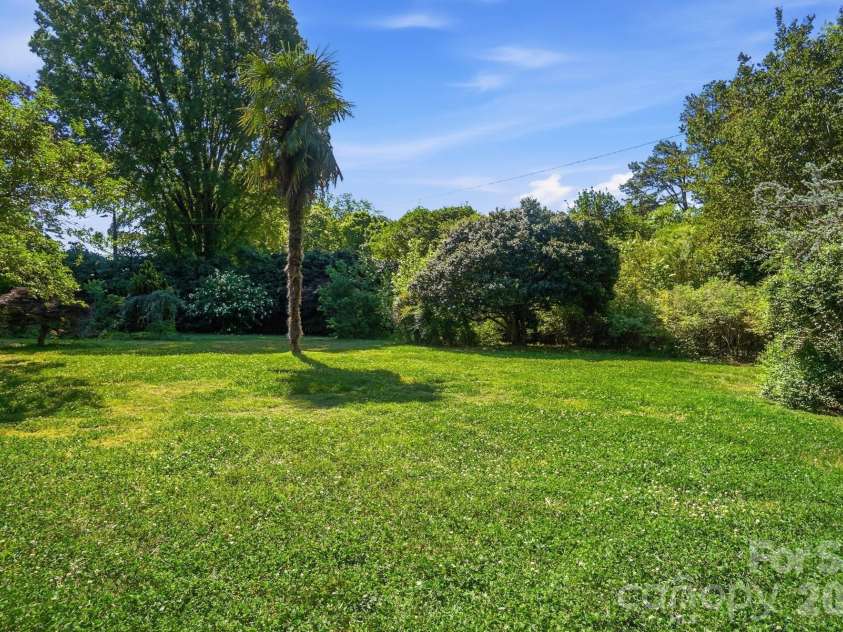 2814 Williams Road, Matthews, NC 28105.  MLS# CAR4372223, YatesRealty ID 14882. Private backyard oasis