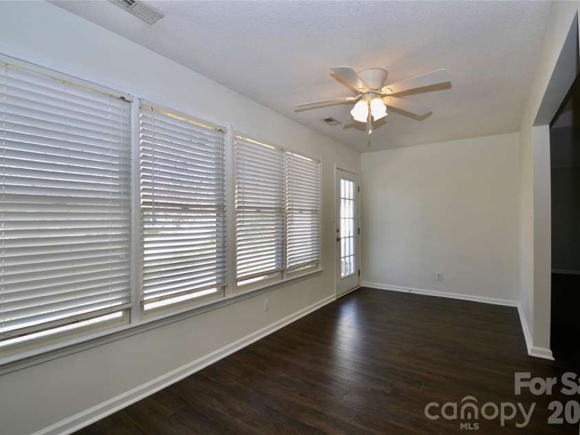 413 Hidden Creek Circle, Salisbury, NC 28147.  MLS# CAR4317143, YatesRealty ID 14883. Sunroom overlooking pond