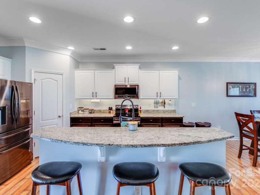 2024 Houndscroft Road, Indian Trail, NC 28079.  MLS# CAR4239156, YatesRealty ID 14885. Oversized island with bar