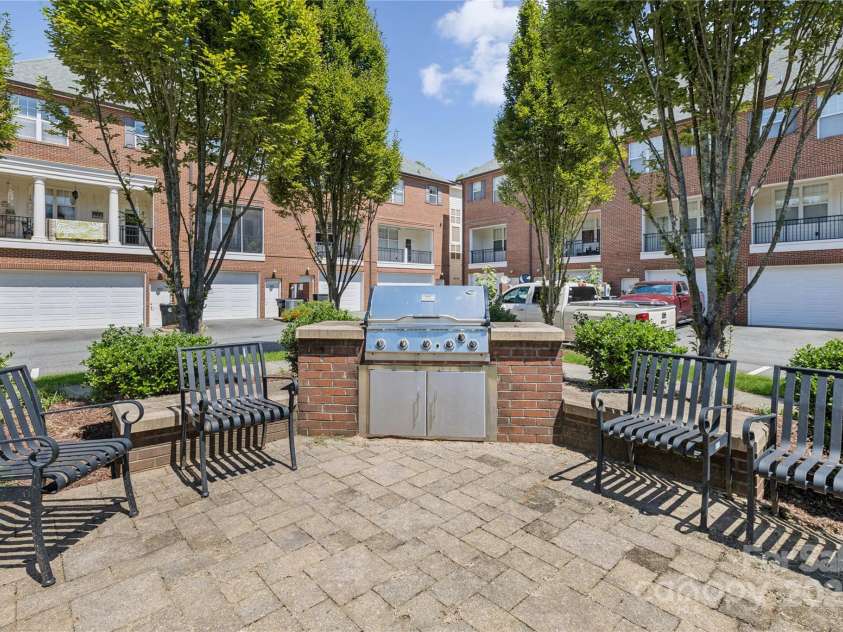 120F Steinbeck Way, Mooresville, NC 28117.  MLS# CAR4258750, YatesRealty ID 14892. BBQ area in the community park.