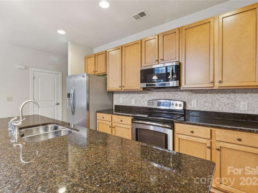 120F Steinbeck Way, Mooresville, NC 28117.  MLS# CAR4258750, YatesRealty ID 14892. Large island