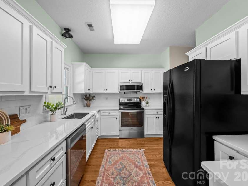2726 Kirkholm Drive, Matthews, NC 28105.  MLS# CAR4370998, YatesRealty ID 14895. 