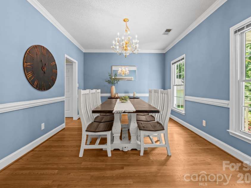 2726 Kirkholm Drive, Matthews, NC 28105.  MLS# CAR4370998, YatesRealty ID 14895. Large dining room for gatherings