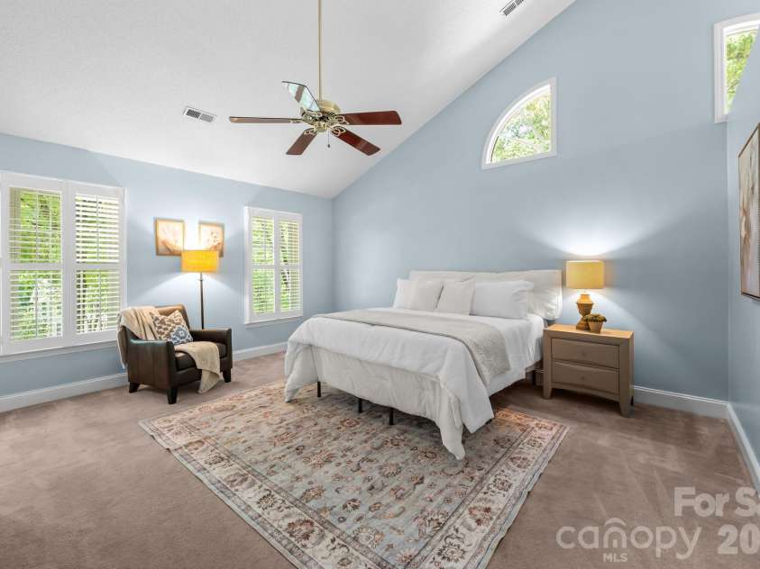 2726 Kirkholm Drive, Matthews, NC 28105.  MLS# CAR4370998, YatesRealty ID 14895. Large primary bedroom with vaulted ceiling