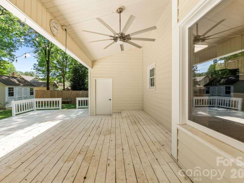 2726 Kirkholm Drive, Matthews, NC 28105.  MLS# CAR4370998, YatesRealty ID 14895. Outdoor covered deck 