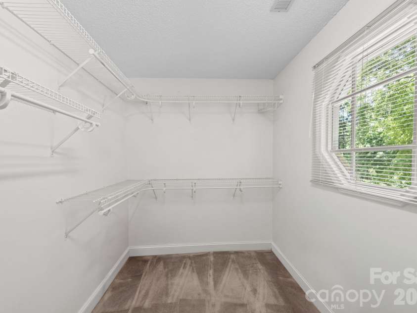 2726 Kirkholm Drive, Matthews, NC 28105.  MLS# CAR4370998, YatesRealty ID 14895. Primary closet