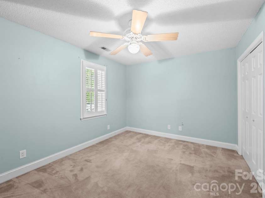 2726 Kirkholm Drive, Matthews, NC 28105.  MLS# CAR4370998, YatesRealty ID 14895. Second bedroom