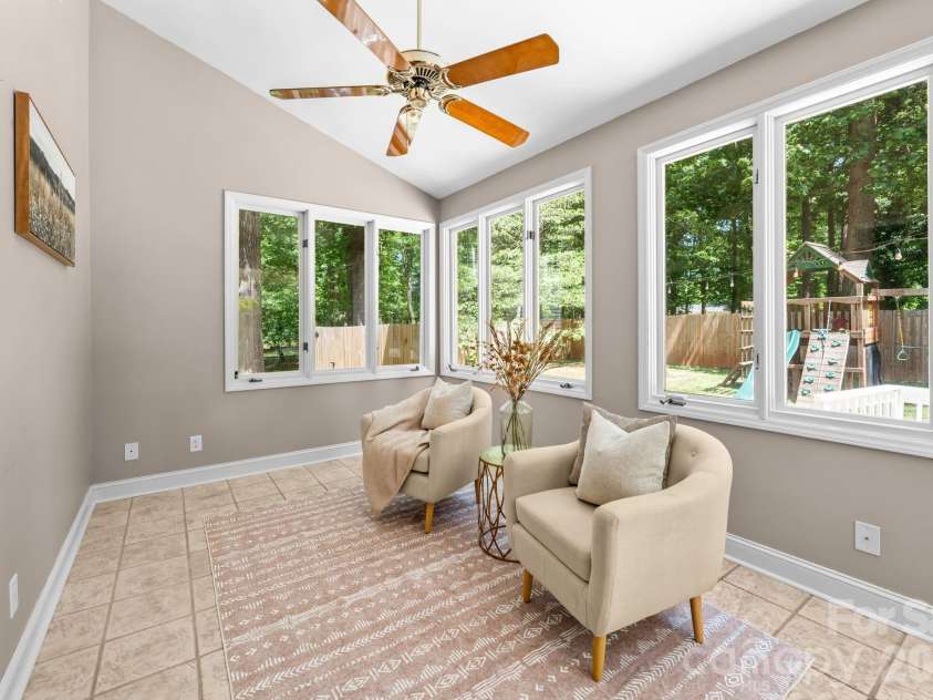2726 Kirkholm Drive, Matthews, NC 28105.  MLS# CAR4370998, YatesRealty ID 14895. Sunroom great for reading or studying