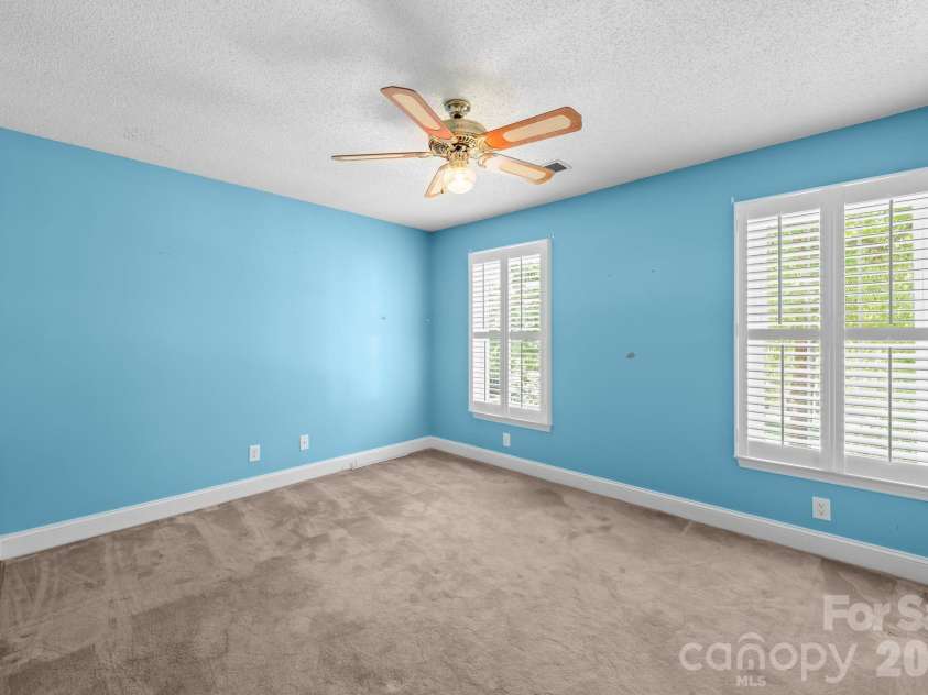 2726 Kirkholm Drive, Matthews, NC 28105.  MLS# CAR4370998, YatesRealty ID 14895. Third bedroom