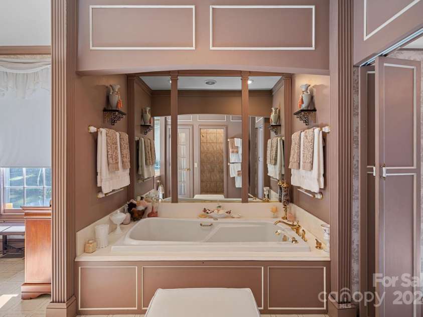 104 Leslie Loop, Mooresville, NC 28115.  MLS# CAR4195674, YatesRealty ID 149. Jetted soaking tub in private nook