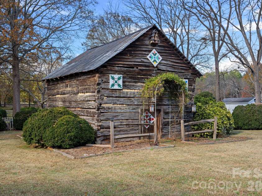 104 Leslie Loop, Mooresville, NC 28115.  MLS# CAR4195674, YatesRealty ID 149. Log Barn outbuilding