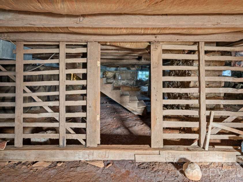 104 Leslie Loop, Mooresville, NC 28115.  MLS# CAR4195674, YatesRealty ID 149. The Cellar was likely used as a small barnyard to keep small animals