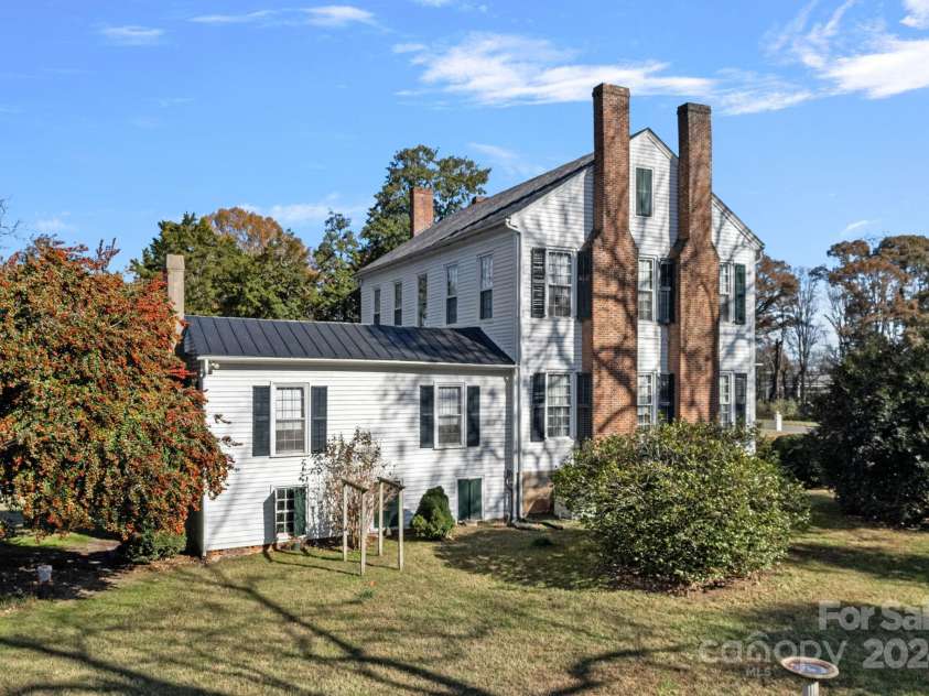 104 Leslie Loop, Mooresville, NC 28115.  MLS# CAR4195674, YatesRealty ID 149. View of the South side of the home