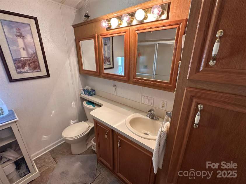 121 Cardinal Drive, New London, NC 28127.  MLS# CAR4314481, YatesRealty ID 1490. 