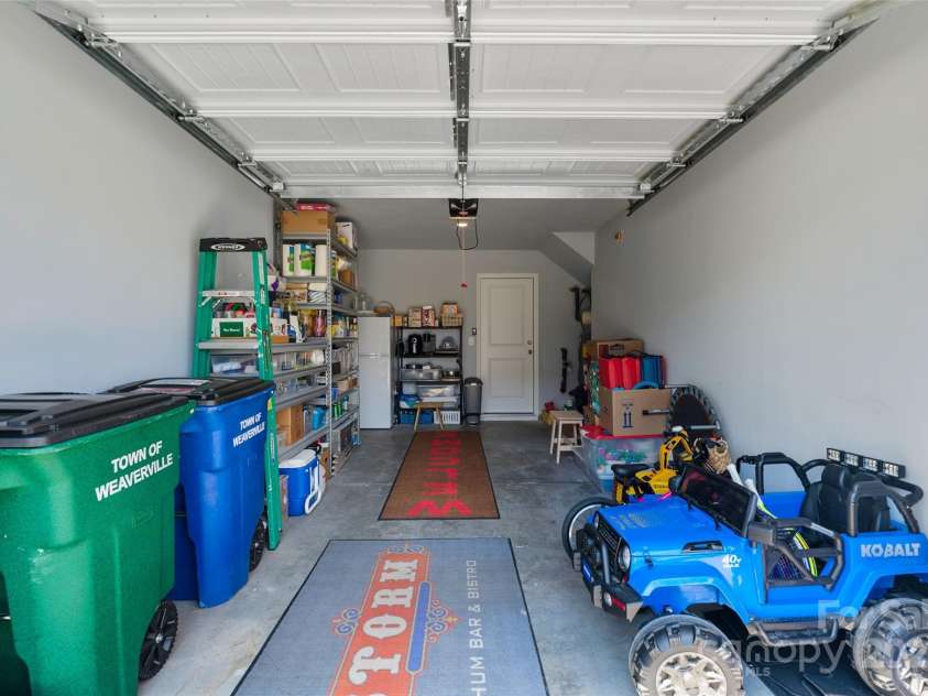 64 Benedict Lane, Weaverville, NC 28787.  MLS# CAR4208936, YatesRealty ID 1490. 1 car main level garage