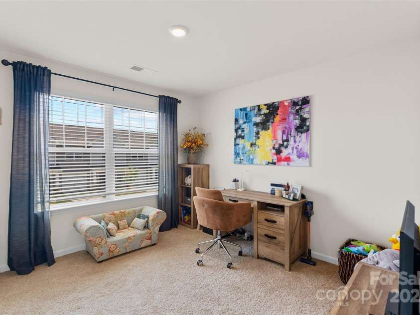 64 Benedict Lane, Weaverville, NC 28787.  MLS# CAR4208936, YatesRealty ID 1490. 1 of 2 upper level guest bedrooms