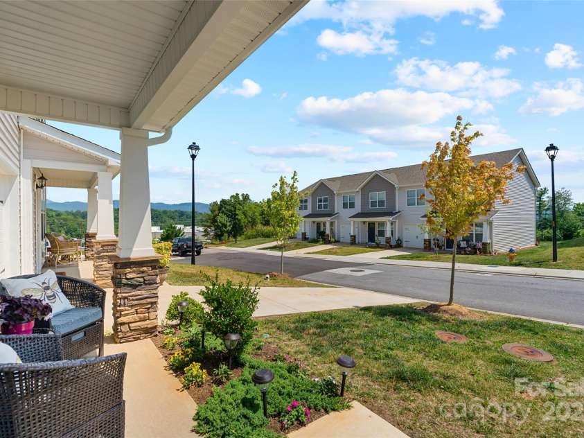 64 Benedict Lane, Weaverville, NC 28787.  MLS# CAR4208936, YatesRealty ID 1490. Covered front porch with views to get to know your neighbors
