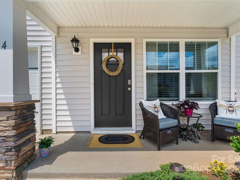 64 Benedict Lane, Weaverville, NC 28787.  MLS# CAR4208936, YatesRealty ID 1490. Inviting covered front porch entry with views