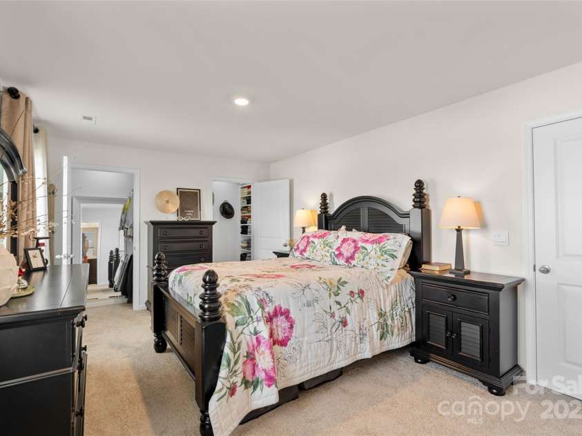 64 Benedict Lane, Weaverville, NC 28787.  MLS# CAR4208936, YatesRealty ID 1490. Large primary bedroom on 2nd level with views and double walk in closets