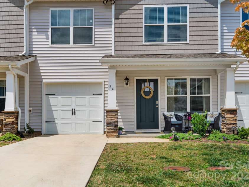 64 Benedict Lane, Weaverville, NC 28787.  MLS# CAR4208936, YatesRealty ID 1490. Move in ready townhome with level driveway and 1 car main level garage