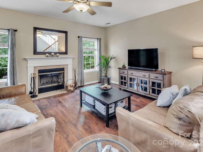 10508 Madison Park Drive, Charlotte, NC 28269.  MLS# CAR4251190, YatesRealty ID 14900. Living Room with Wood Fireplace