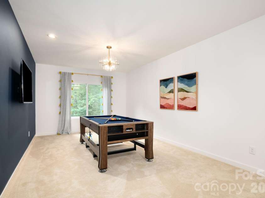 559 Shining Rock Path, Horse Shoe, NC 28742.  MLS# CAR4372540, YatesRealty ID 14910. Versatile bonus room perfect for media or game space.