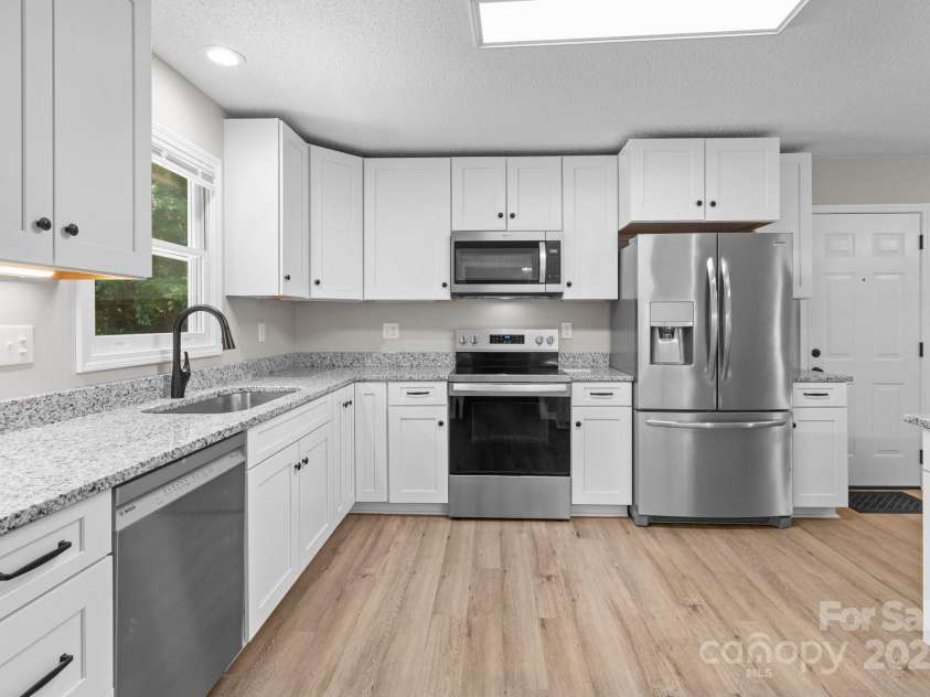 219 Proctor Drive, Salisbury, NC 28147.  MLS# CAR4259804, YatesRealty ID 14915. Updated kitchen features soft close cabinetry and granite counters