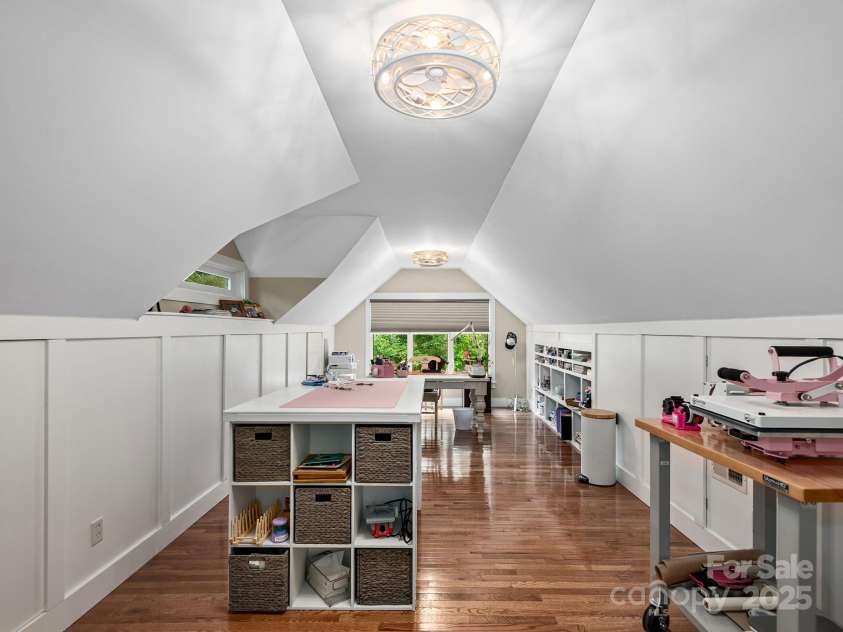 15 Bonnies Lane, Asheville, NC 28803.  MLS# CAR4252426, YatesRealty ID 14917. Craft room, all the side panels are hidden closets for ample storage.