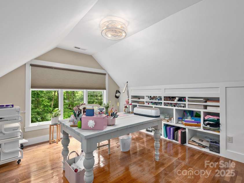 15 Bonnies Lane, Asheville, NC 28803.  MLS# CAR4252426, YatesRealty ID 14917. Craft room, all the side panels are hidden closets for ample storage.